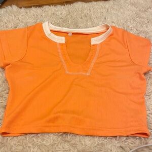 Orange faux button crop top